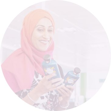 Muslim woman holding P&G producsts